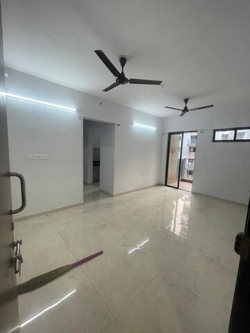 Living Room in 1.5 BHK Apartment at Lodha Palava Downtown, Dombivli East – for Sale