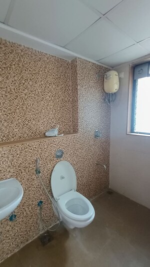 Bathroom in 1.5 BHK Apartment at Lodha Palava Downtown, Dombivli East – for Sale