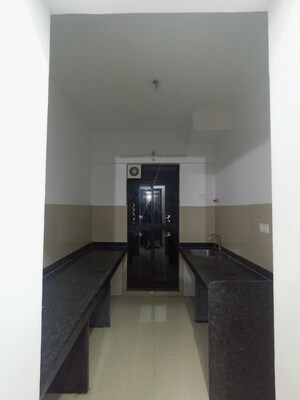 Kitchen in 1 BHK Apartment at Lodha Palava Downtown, Dombivli East – for Sale