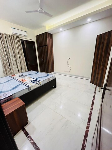 Bedroom in 4 BHK Builder Floor at Ansal Sushant Apartments, Sushant Lok I – for Rent