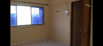 Bedroom in 1 BHK Apartment at Asmita Jyoti CHS, Malad West – for Rent