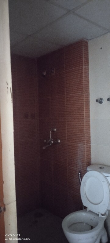 Bathroom in 2 BHK Apartment at Mahagun Mywoods, Sector 16c Greater Noida – for Rent