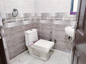 Bathroom in 2 BHK Apartment at Panchsheel Enclave – for Sale
