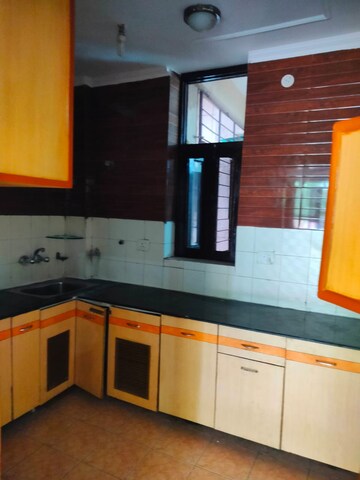 Kitchen in 2 BHK Apartment at Panchsheel Enclave – for Sale