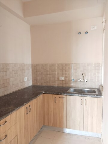 Kitchen in 3 BHK Apartment at Amrapali Dream Valley, Tech Zone 4 Greater Noida – for Rent