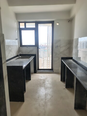 Kitchen in 2 BHK Apartment at Naman Habitat, Andheri West – for Rent