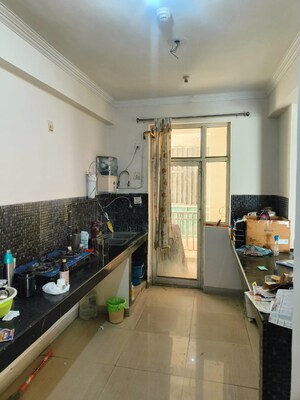Kitchen in 2 BHK Apartment at Panchsheel Wellington, Dundahera – for Sale