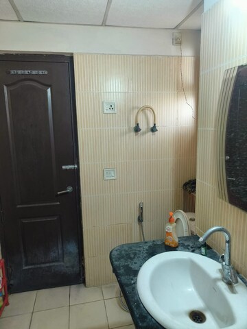 Bathroom in 2 BHK Apartment at Panchsheel Wellington, Dundahera – for Sale