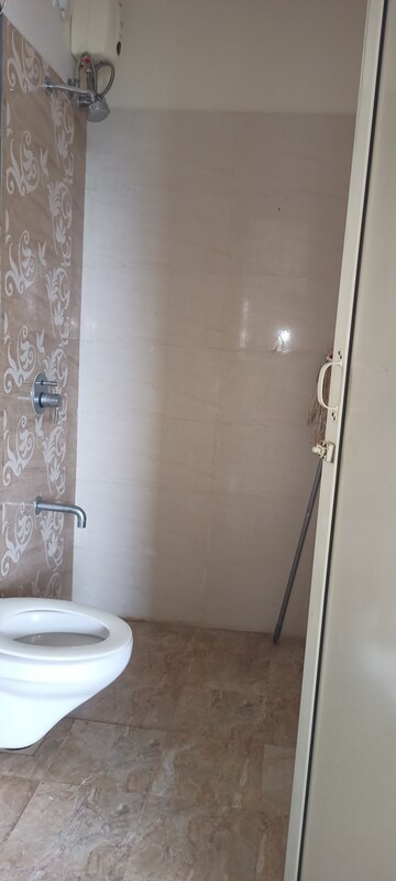 Bathroom in 1 BHK Apartment at Rajendra Dolphin Tower, Malad West – for Rent