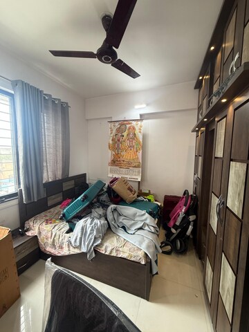 Bedroom in 2 BHK Apartment at Royal Ishana, Thergaon – for Rent
