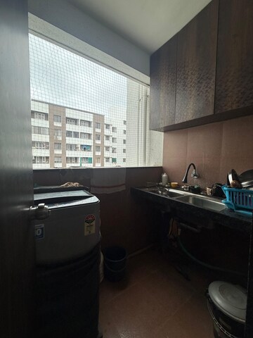 Utility Room in 2 BHK Apartment at Royal Ishana, Thergaon – for Rent