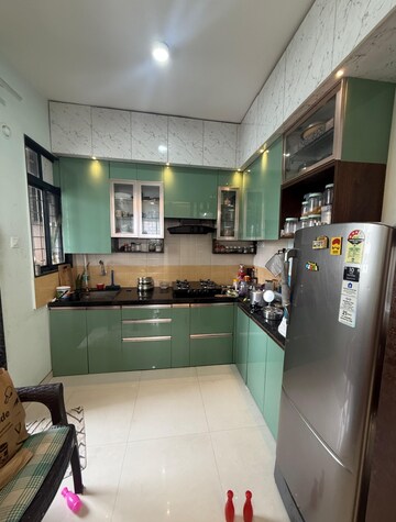 Kitchen in 2 BHK Apartment at Royal Ishana, Thergaon – for Rent