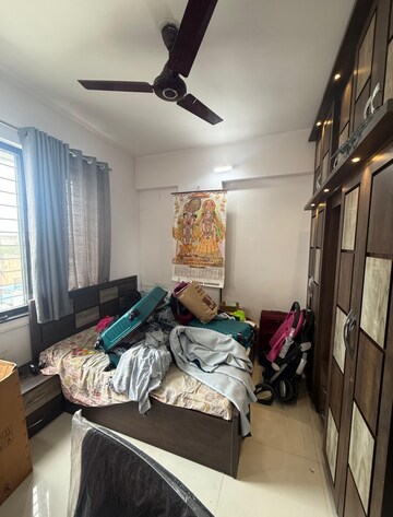 Master Bedroom in 2 BHK Apartment at Royal Ishana, Thergaon – for Rent