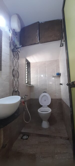 Bathroom in 2 BHK Apartment at Pushpraj Building, Goregaon East – for Sale