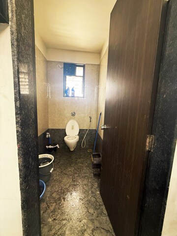 Bathroom in 2 BHK Apartment at Royal Ishana, Thergaon – for Rent