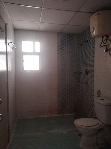 Bathroom in 3 BHK Apartment at Omaxe Grand, Sector 93b – for Rent