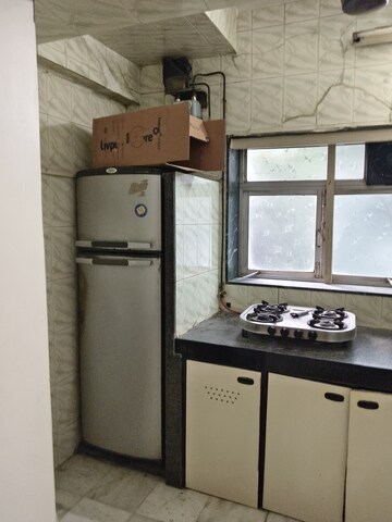 Kitchen in 1 BHK Apartment at Vile Parle West – for Rent