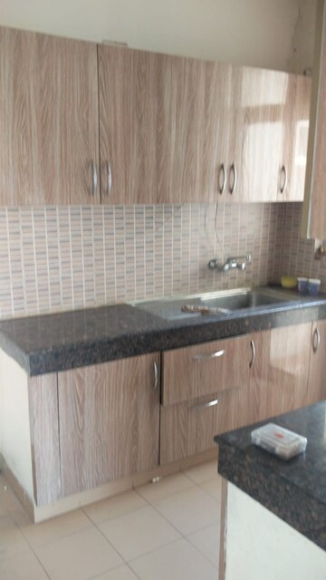 Kitchen in 2 BHK Apartment at Omaxe Grand, Sector 93b – for Sale