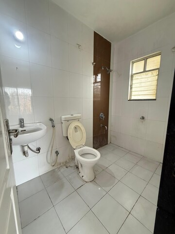 Bathroom in 3 BHK Apartment at Yash Wisteria, Wakad – for Rent