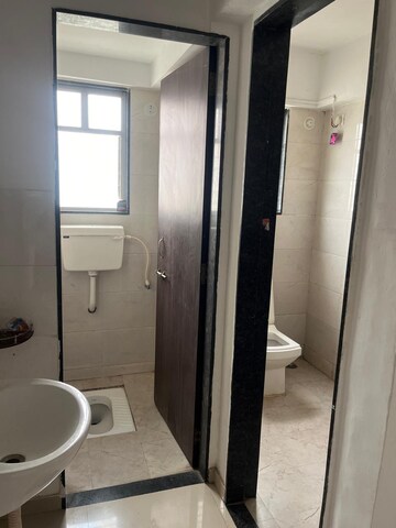 Bathroom in 1 BHK Apartment at Sai Samarth Shreya, Punawale – for Rent