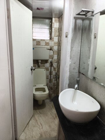 Bathroom in 1 BHK Apartment at Vileparle Prarthana CHS, Vile Parle East – for Rent
