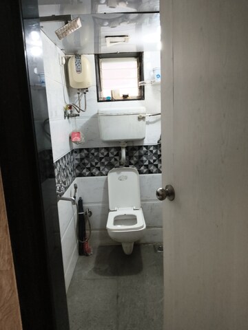 Bathroom in 1 BHK Apartment at Vileparle Prarthana CHS, Vile Parle East – for Rent