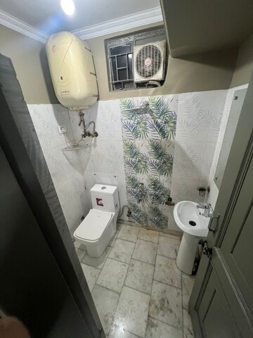 Bathroom in 1 BHK Builder Floor at Khirki Extension – for Sale