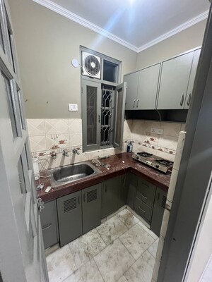 Kitchen in 1 BHK Builder Floor at Khirki Extension – for Sale