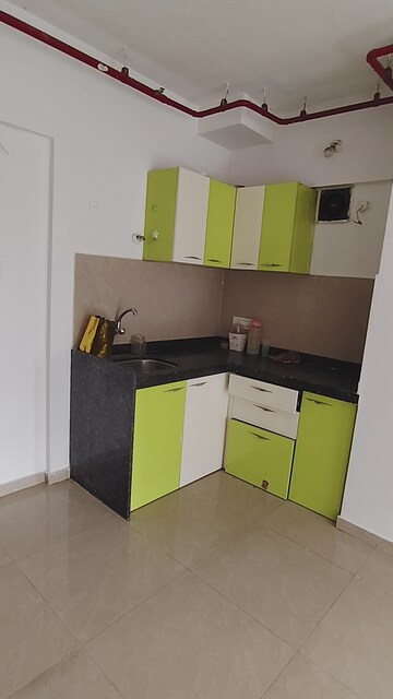 Kitchen in 1 BHK Apartment at JP North Elara, Mira Road – for Sale