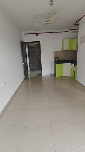 Living Room in 1 BHK Apartment at JP North Elara, Mira Road – for Sale