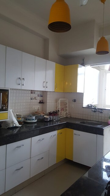 Kitchen in 2 BHK Apartment at Antriksh Golf View, Sector 78 – for Rent