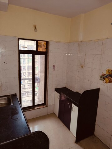 Kitchen in 1 BHK Apartment at Nine Sea Grapes, Nalasopara West – for Rent
