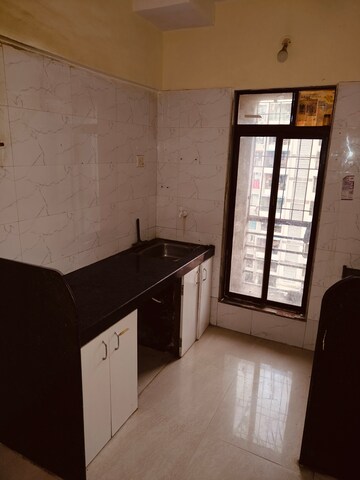 Kitchen in 1 BHK Apartment at Nine Sea Grapes, Nalasopara West – for Rent
