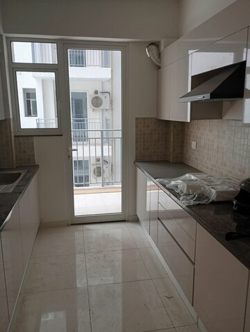 Kitchen in 3 BHK Apartment at Godrej Woods, Sector 43 – for Rent