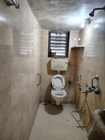 Bathroom in 2 BHK Apartment at Bharati Niwas, Santacruz West – for Rent