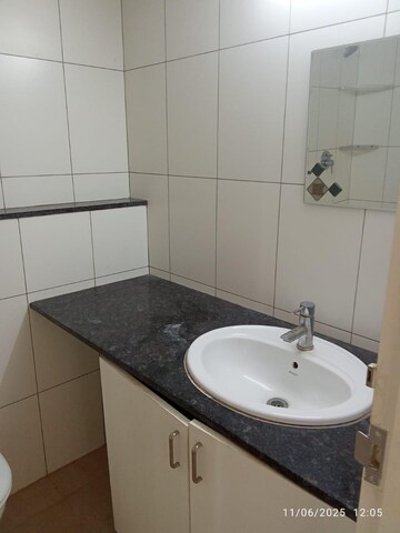 Bathroom in 2.5 BHK Apartment at Godrej Aqua, International Airport Road – for Rent