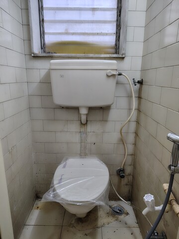 Bathroom in 1 BHK Apartment at Bharati Niwas, Santacruz West – for Rent
