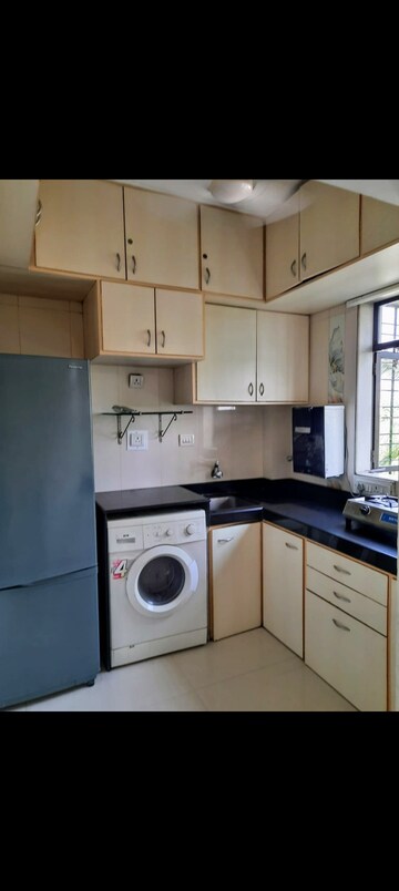 Kitchen in 1.5 BHK Apartment at Rays Apartment, Bandra West – for Rent