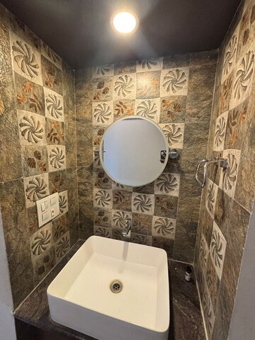 Bathroom in 3 BHK Apartment at Royal Imperio, Pimple Saudagar – for Rent