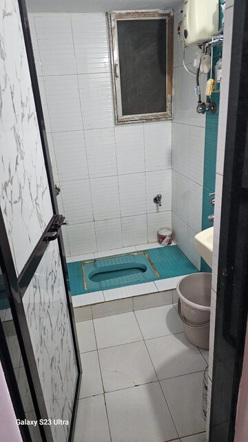 Bathroom in 1 BHK Apartment at Arunodaya Heights Apartments, Mira Road East – for Rent