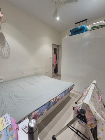 Bedroom in 3.5 BHK Apartment at The Wadhwa Palm Beach Residency, Nerul Sector 4 – for Rent
