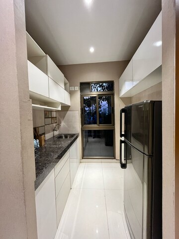 Kitchen in 1 BHK Apartment at Godrej Riviera, Ambivali – for Sale
