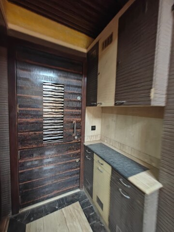 Kitchen in 2.5 BHK Apartment at The Wadhwa Palm Beach Residency, Nerul Sector 4 – for Rent