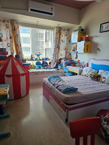 Bedroom in 2.5 BHK Apartment at The Wadhwa Palm Beach Residency, Nerul Sector 4 – for Rent
