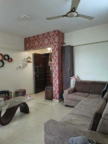 Living Room in 2 BHK Apartment at Courtyard by Narang Realty and The Wadhwa Group, Pokhran Road No Two – for Rent