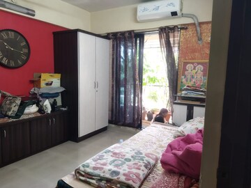 Bedroom in 2 BHK Apartment at Riddhi Garden, Malad East – for Rent