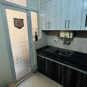 Kitchen in 2 BHK Apartment at Nirala Aspire, Panchsheel Green – for Sale