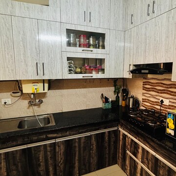 Kitchen in 2 BHK Apartment at Nirala Aspire, Panchsheel Green – for Sale