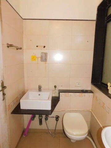 Bathroom in 2 BHK Apartment at Ashish Garden Estate, Goregaon West – for Rent