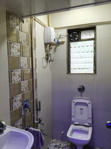 Bathroom in 2 BHK Apartment at Teachers Colony, Bandra East – for Rent